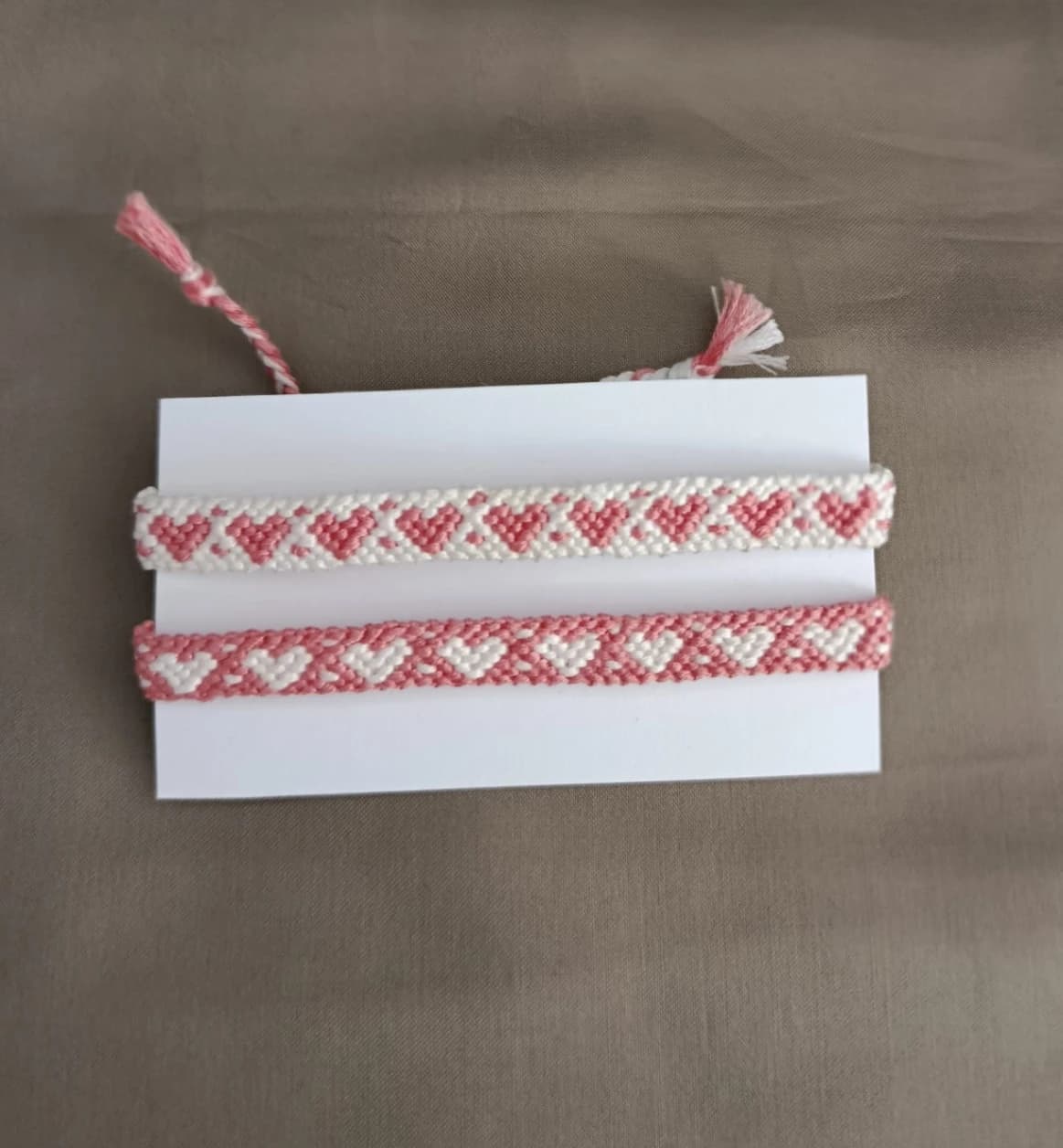 Handwoven heart friendship bracelet.
